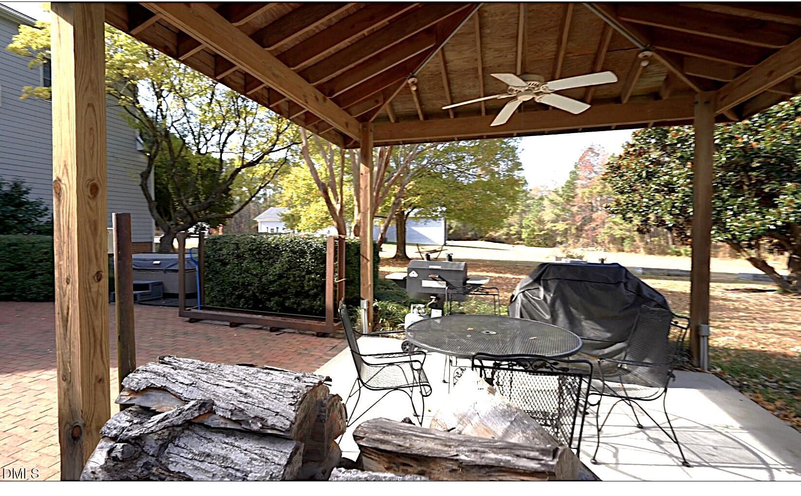 220 Jordan Narron Road Selma, NC 27576 - Photo 59 of 87 a backyard of a house with table and chairs