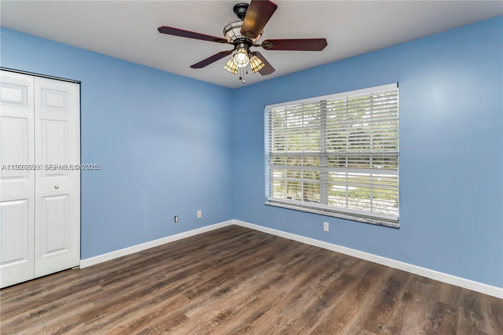 17996 North 42nd Road North Loxahatchee, FL 33470 - Photo 13 of 34 a view of an empty room with a window