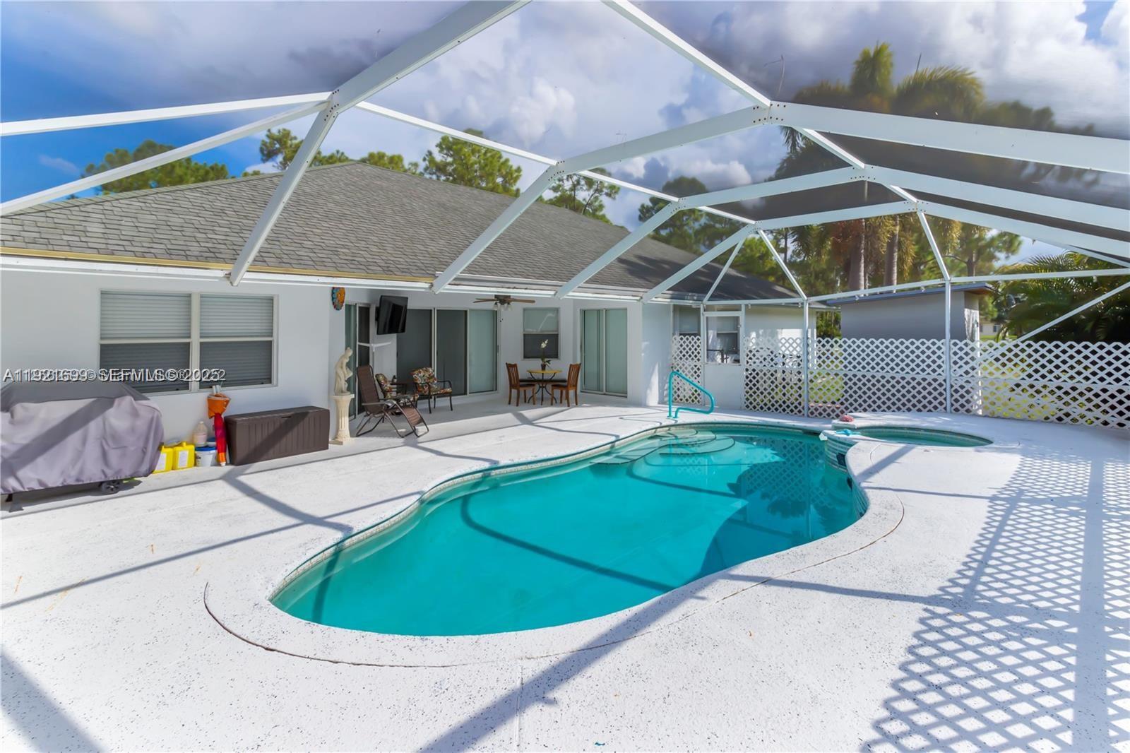 17996 North 42nd Road North Loxahatchee, FL 33470 - Photo 20 of 34 a view of a house with sitting area and furniture