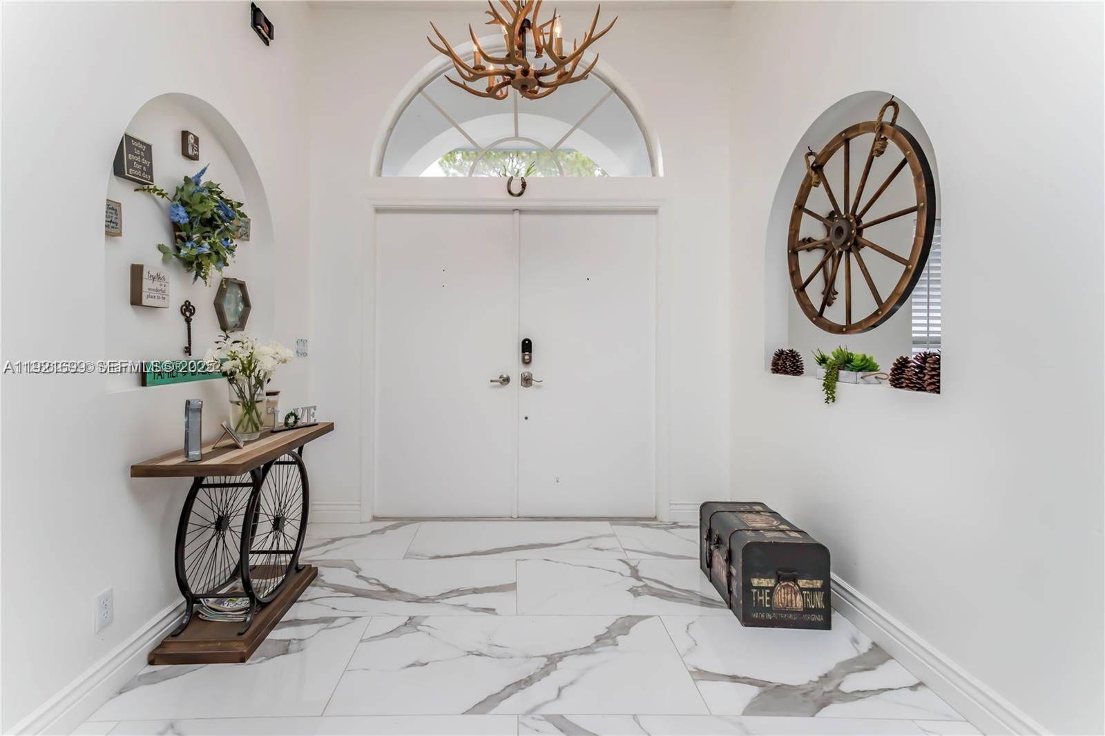 17996 North 42nd Road North Loxahatchee, FL 33470 - Photo 4 of 34 a view of entryway with wooden floor
