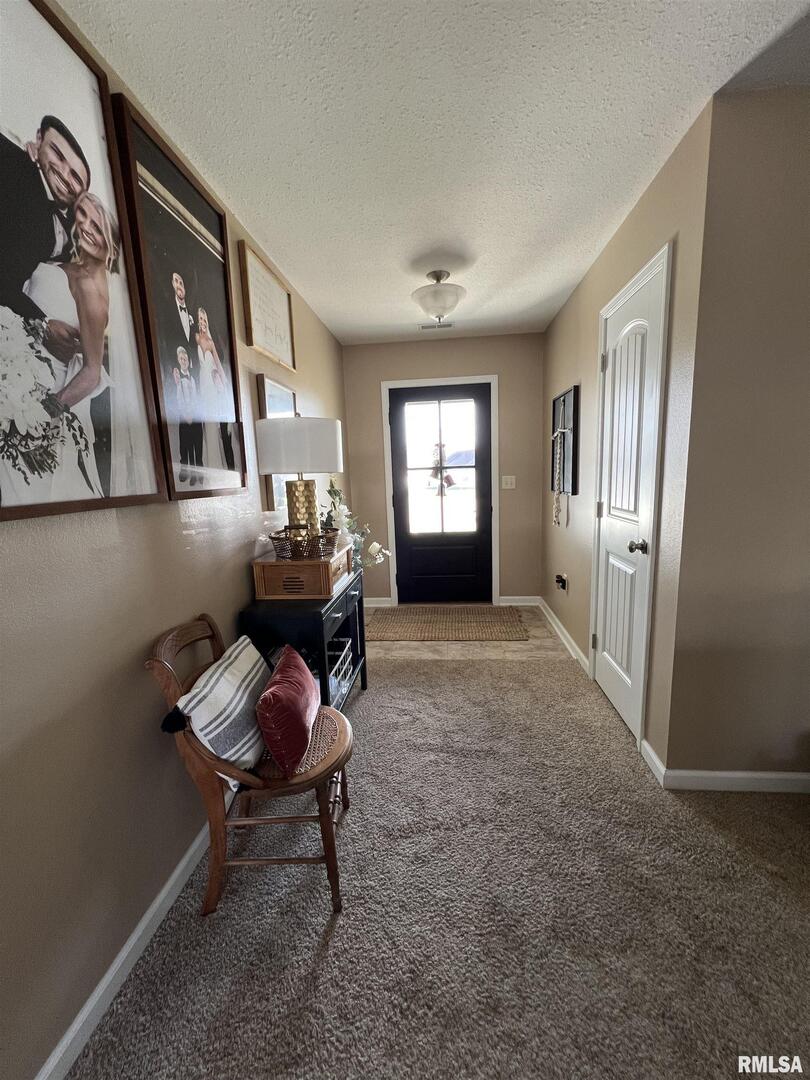 413 West Beacon Court Mount Vernon, IL 62864 - Photo 16 of 34 a living room with furniture and a window