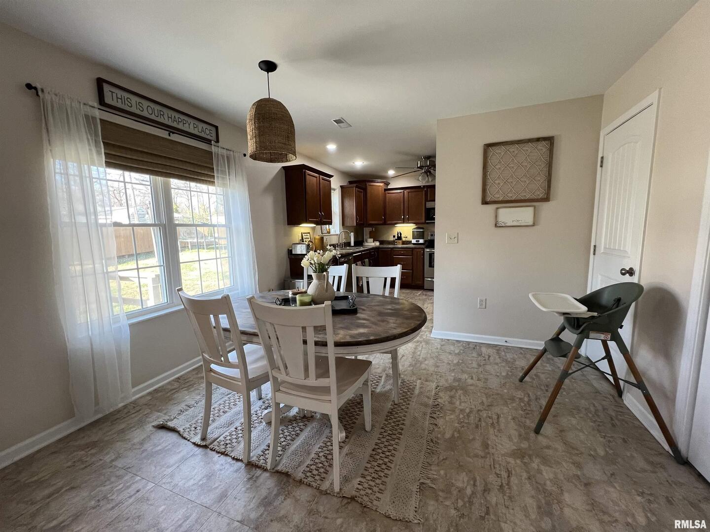 413 West Beacon Court Mount Vernon, IL 62864 - Photo 24 of 34 a dining room with furniture and window