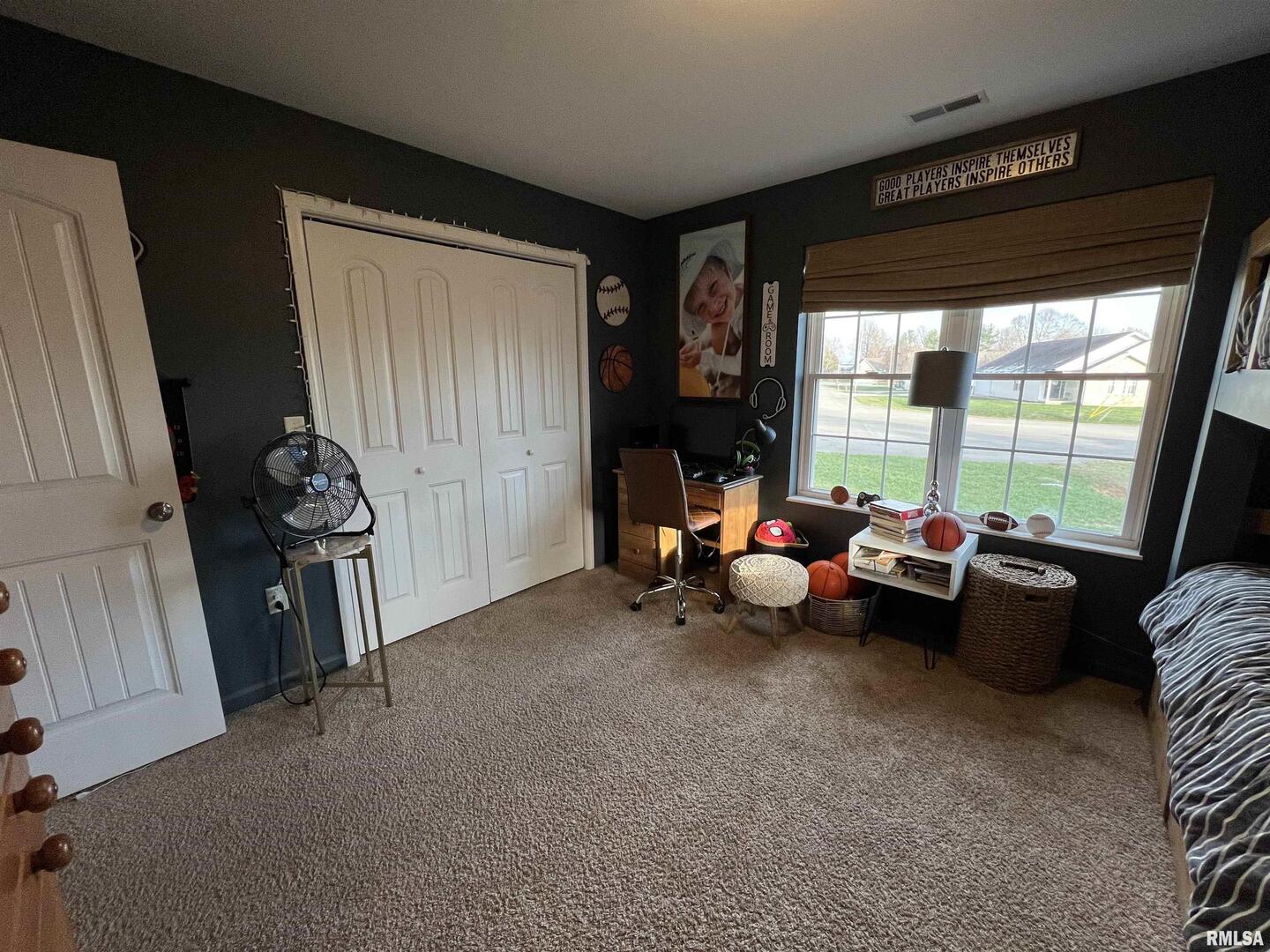 413 West Beacon Court Mount Vernon, IL 62864 - Photo 30 of 34 a living room with furniture and a floor to ceiling window