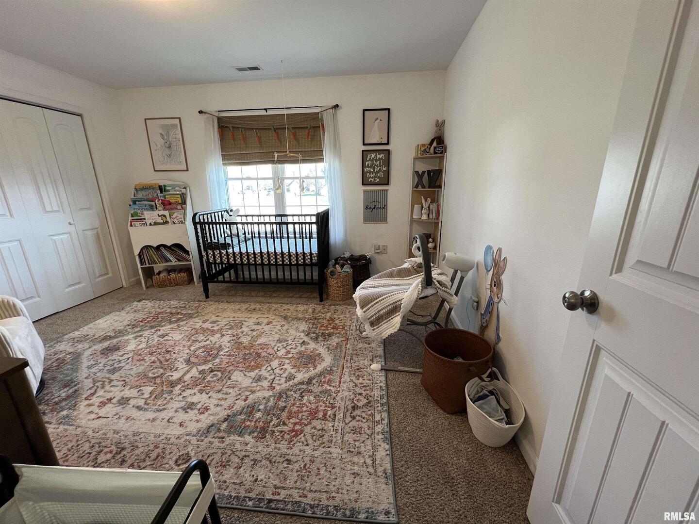 413 West Beacon Court Mount Vernon, IL 62864 - Photo 33 of 34 a bedroom with furniture and a window