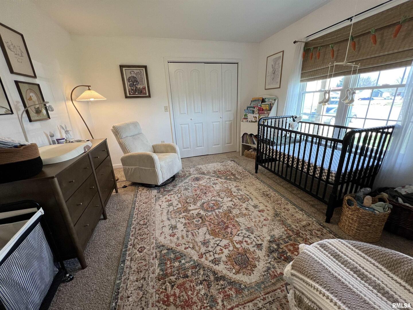 413 West Beacon Court Mount Vernon, IL 62864 - Photo 34 of 34 a bedroom with a bed and a window