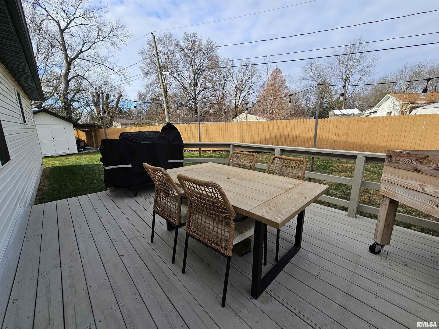 413 West Beacon Court Mount Vernon, IL 62864 - Photo 7 of 34 a view of a chairs on the roof deck