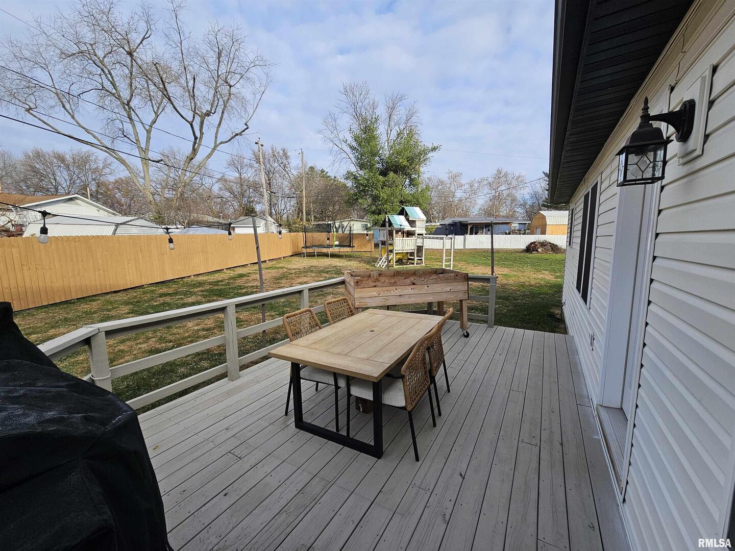 413 West Beacon Court Mount Vernon, IL 62864 - Photo 8 of 34 a view of a balcony with wooden floor and outdoor seating