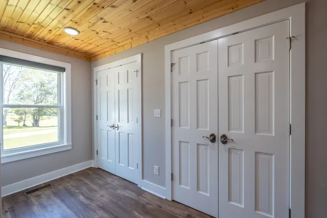 a view of a hallway with a window