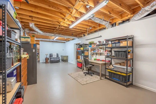 a room with storage and a furniture