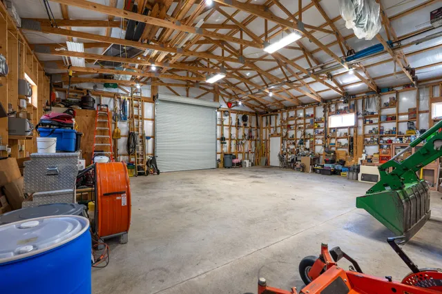 a room with gym equipment and storage