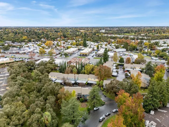 an aerial view of residential house with outdoor space