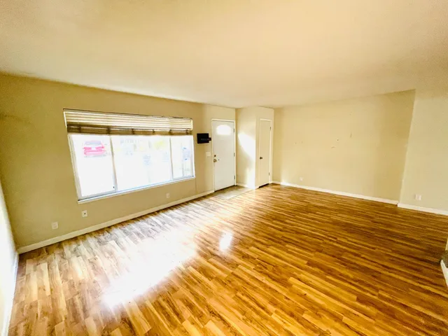 a view of an empty room and window