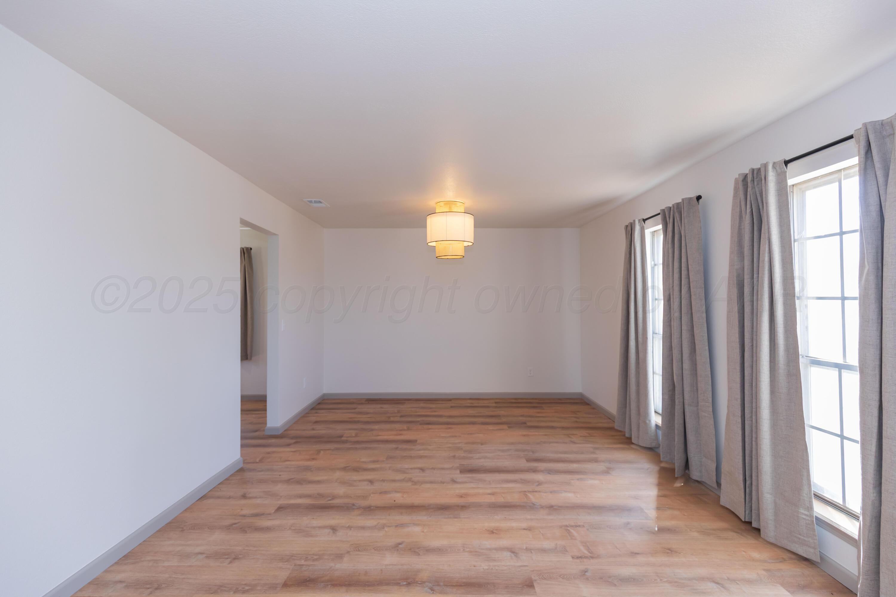 3304 Mockingbird Lane Amarillo, TX 79109 - Photo 20 of 42 FORMAL DINING VIEW 4