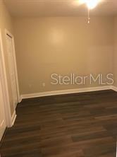 6413 Astor Village Avenue, Unit 212 Orlando, FL 32835 - Photo 5 of 16 a view of wooden floor
