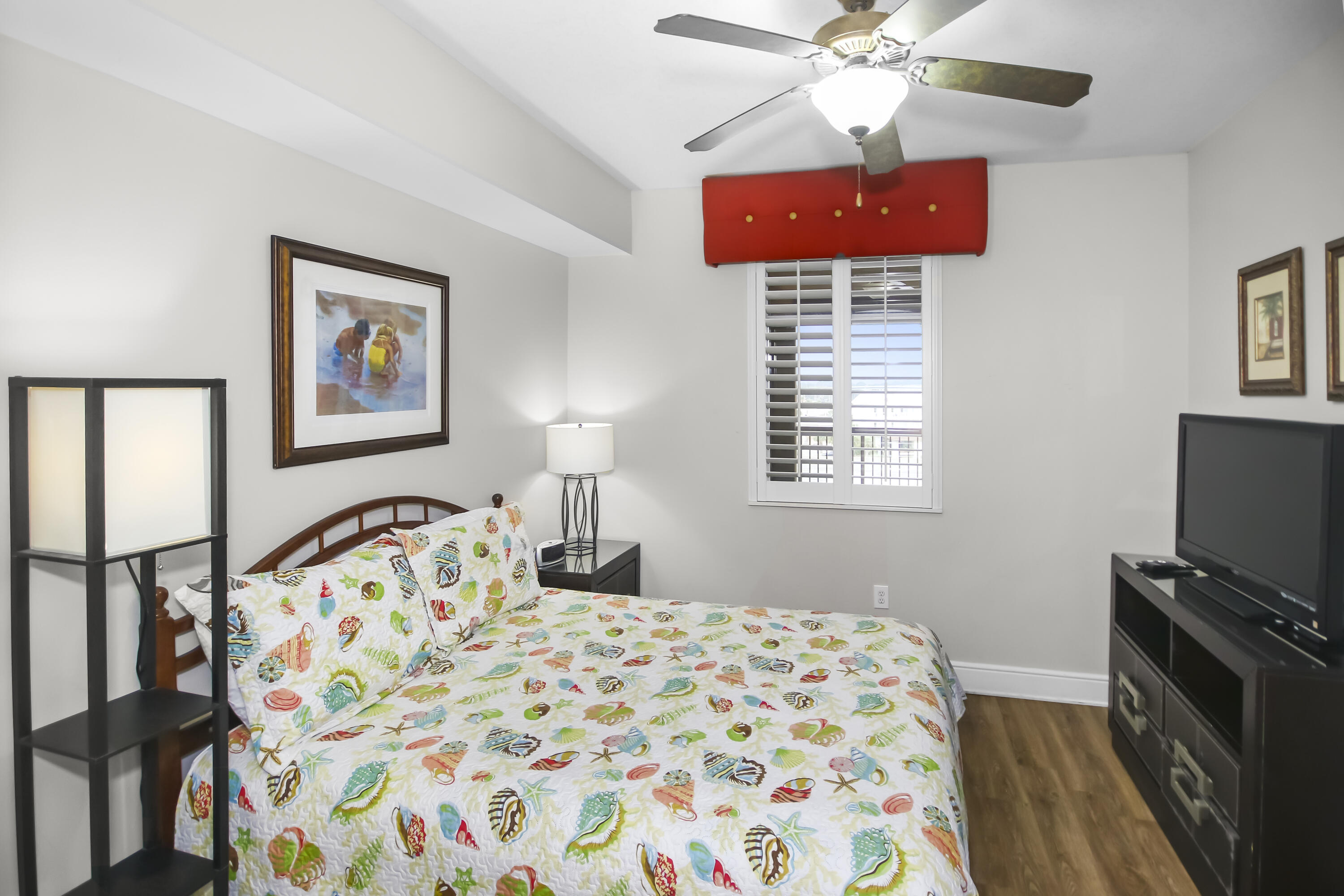 1150 Santa Rosa Boulevard, Unit 502 Fort Walton Beach, FL 32548 - Photo 17 of 43 a bedroom with a bed and a window