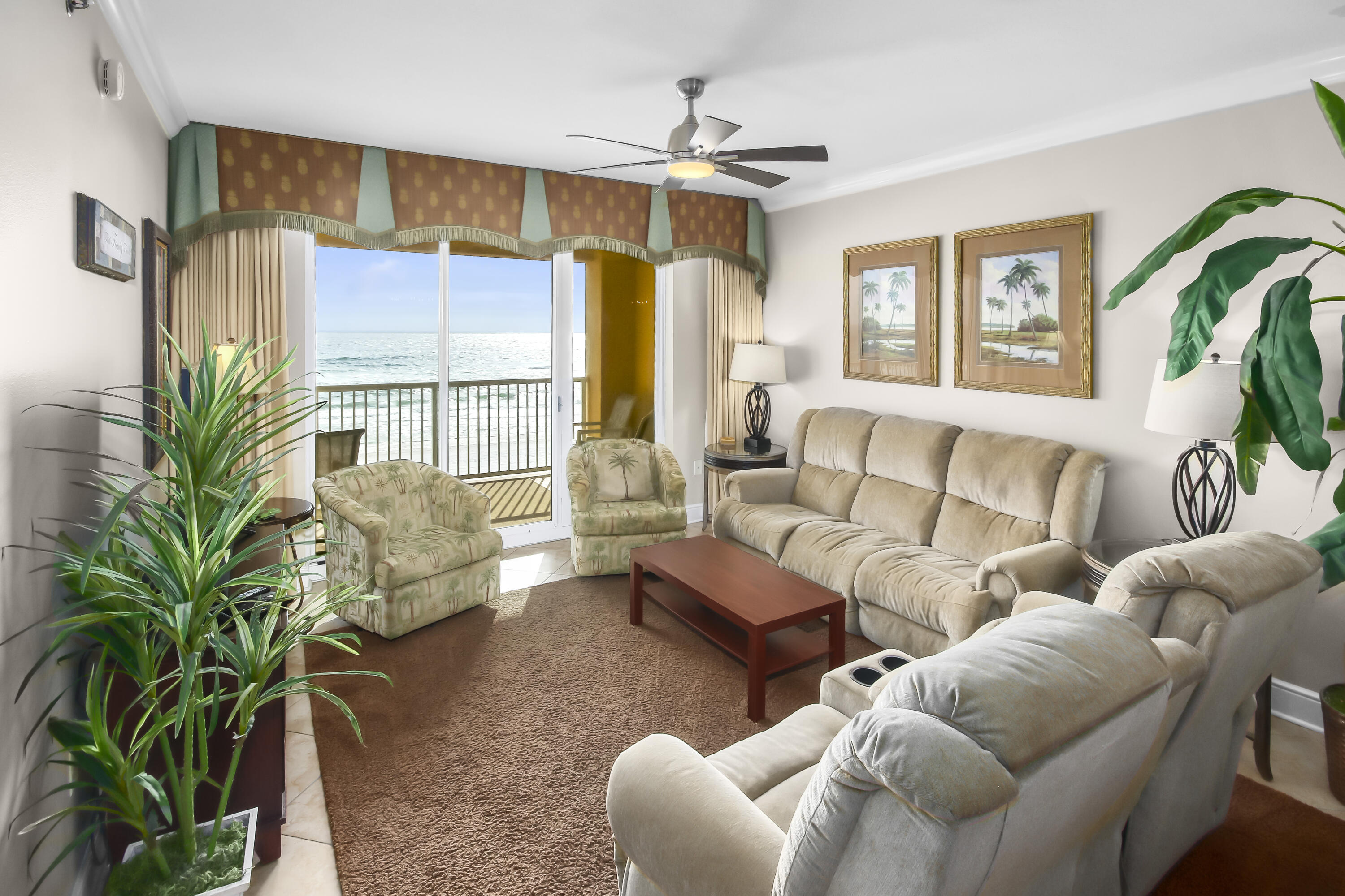 1150 Santa Rosa Boulevard, Unit 502 Fort Walton Beach, FL 32548 - Photo 2 of 43 a living room with furniture plant and a large window