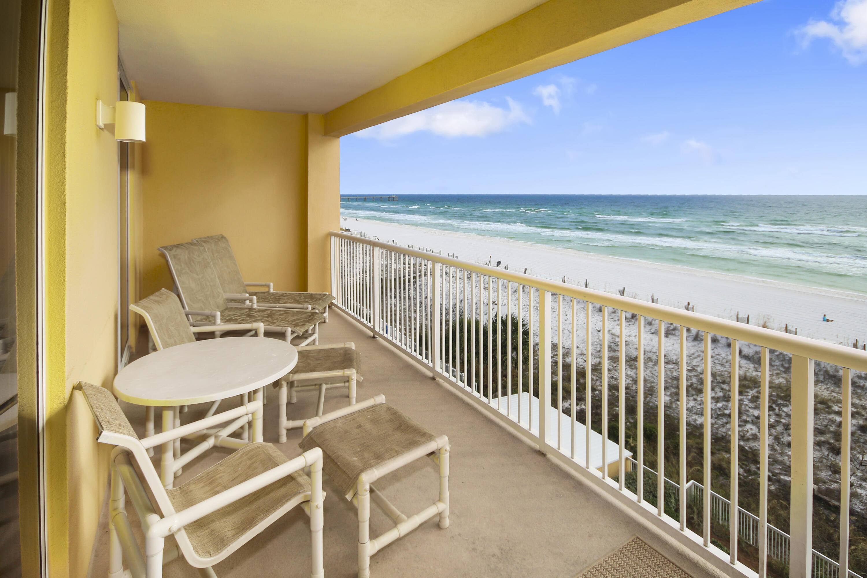 1150 Santa Rosa Boulevard, Unit 502 Fort Walton Beach, FL 32548 - Photo 23 of 43 a view of a balcony with chair and table