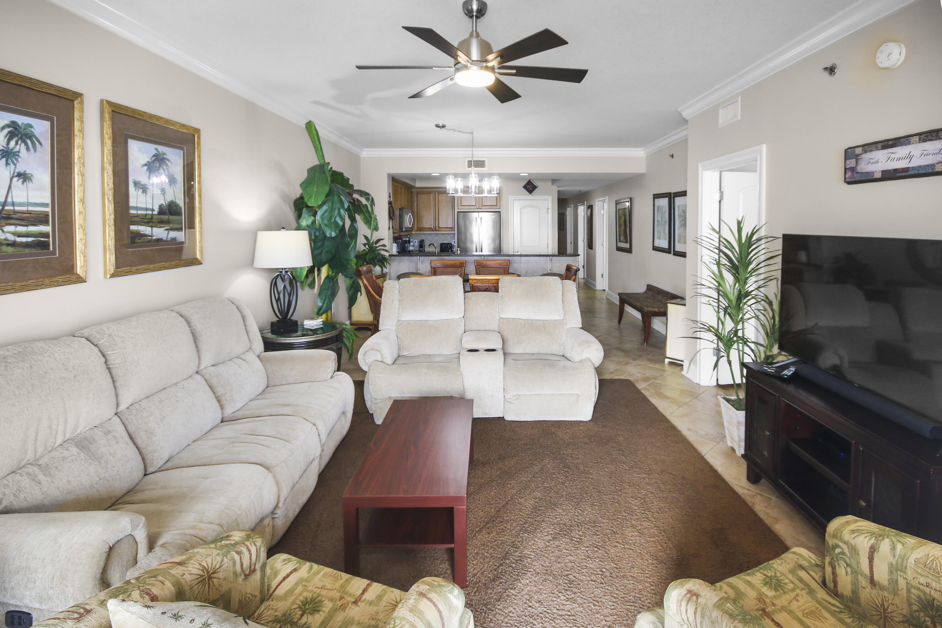 1150 Santa Rosa Boulevard, Unit 502 Fort Walton Beach, FL 32548 - Photo 4 of 43 a living room with furniture and a flat screen tv