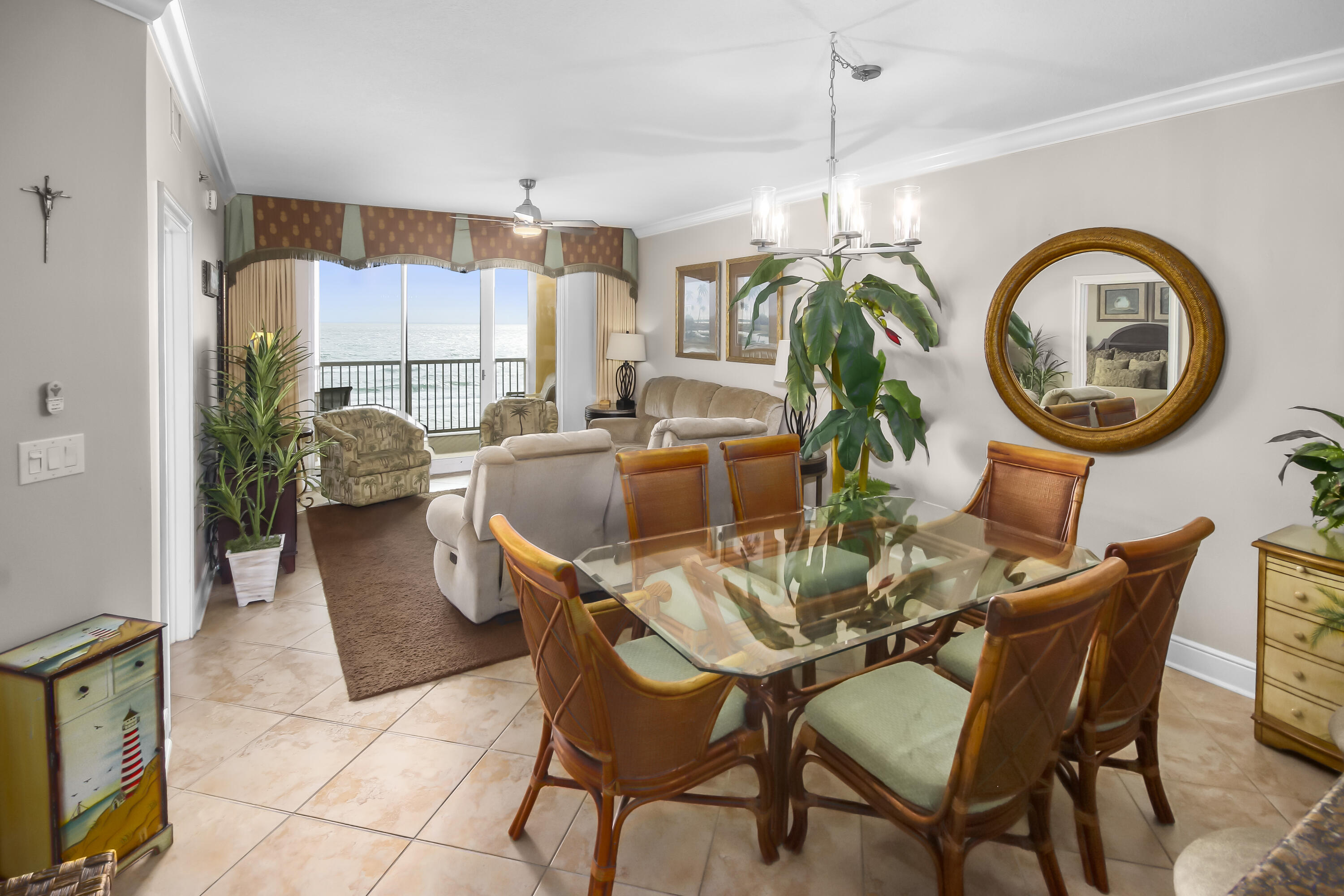 1150 Santa Rosa Boulevard, Unit 502 Fort Walton Beach, FL 32548 - Photo 5 of 43 a dining room with furniture and a chandelier