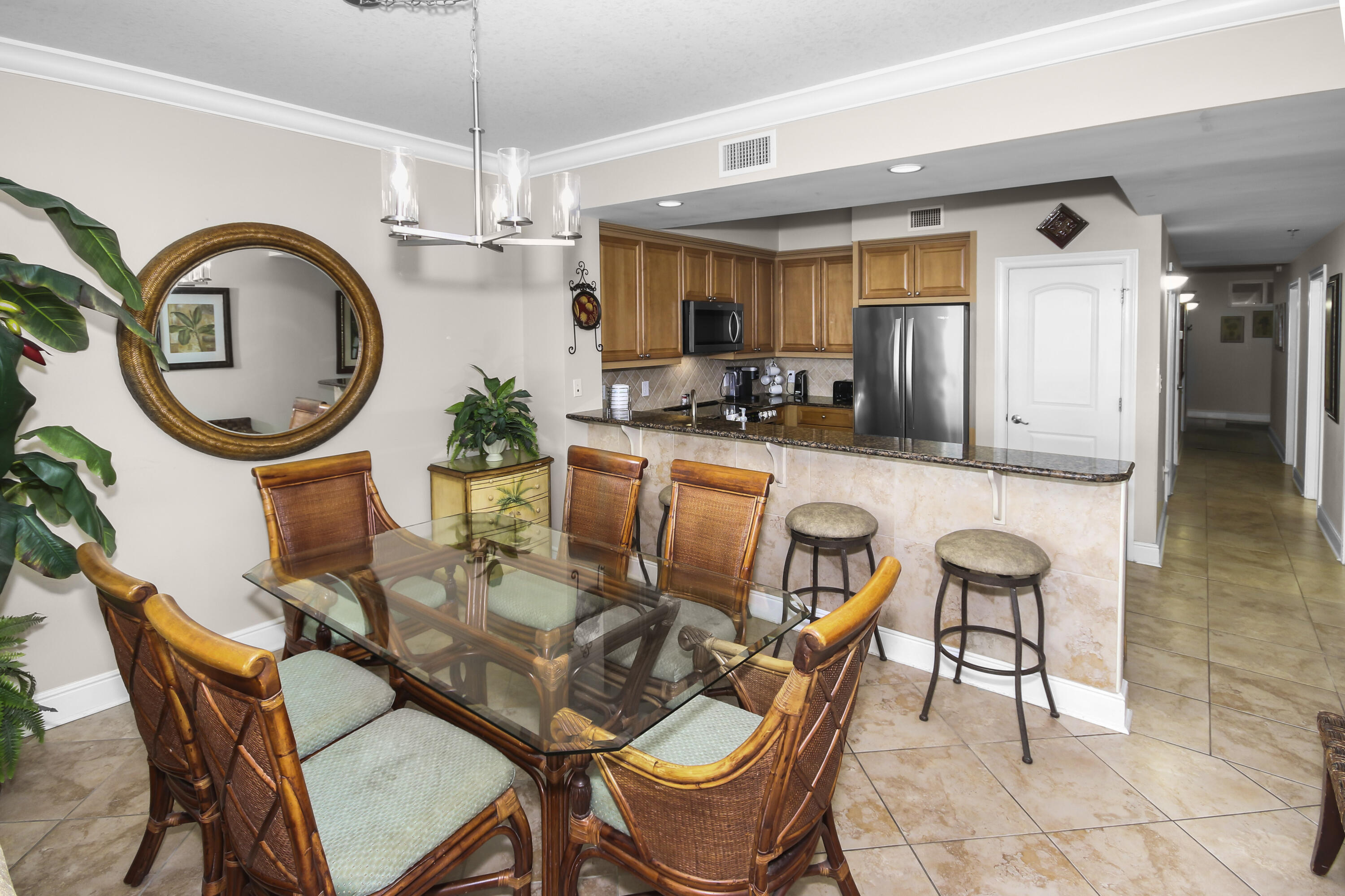 1150 Santa Rosa Boulevard, Unit 502 Fort Walton Beach, FL 32548 - Photo 6 of 43 a view of a dining room with furniture