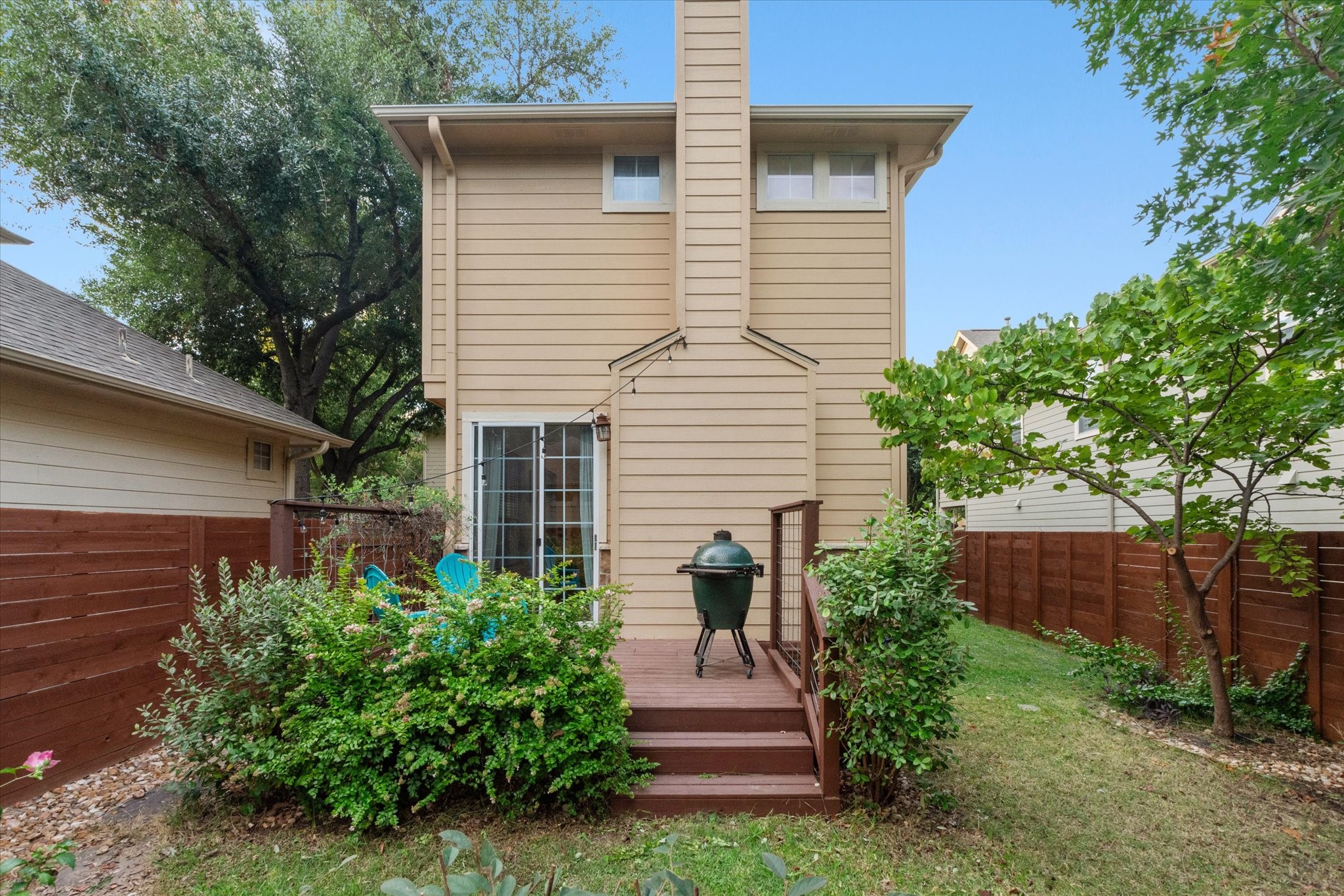 11000 Anderson Mill Road, Unit 34 Austin, TX 78750 - Photo 14 of 18 a front view of a house with a yard