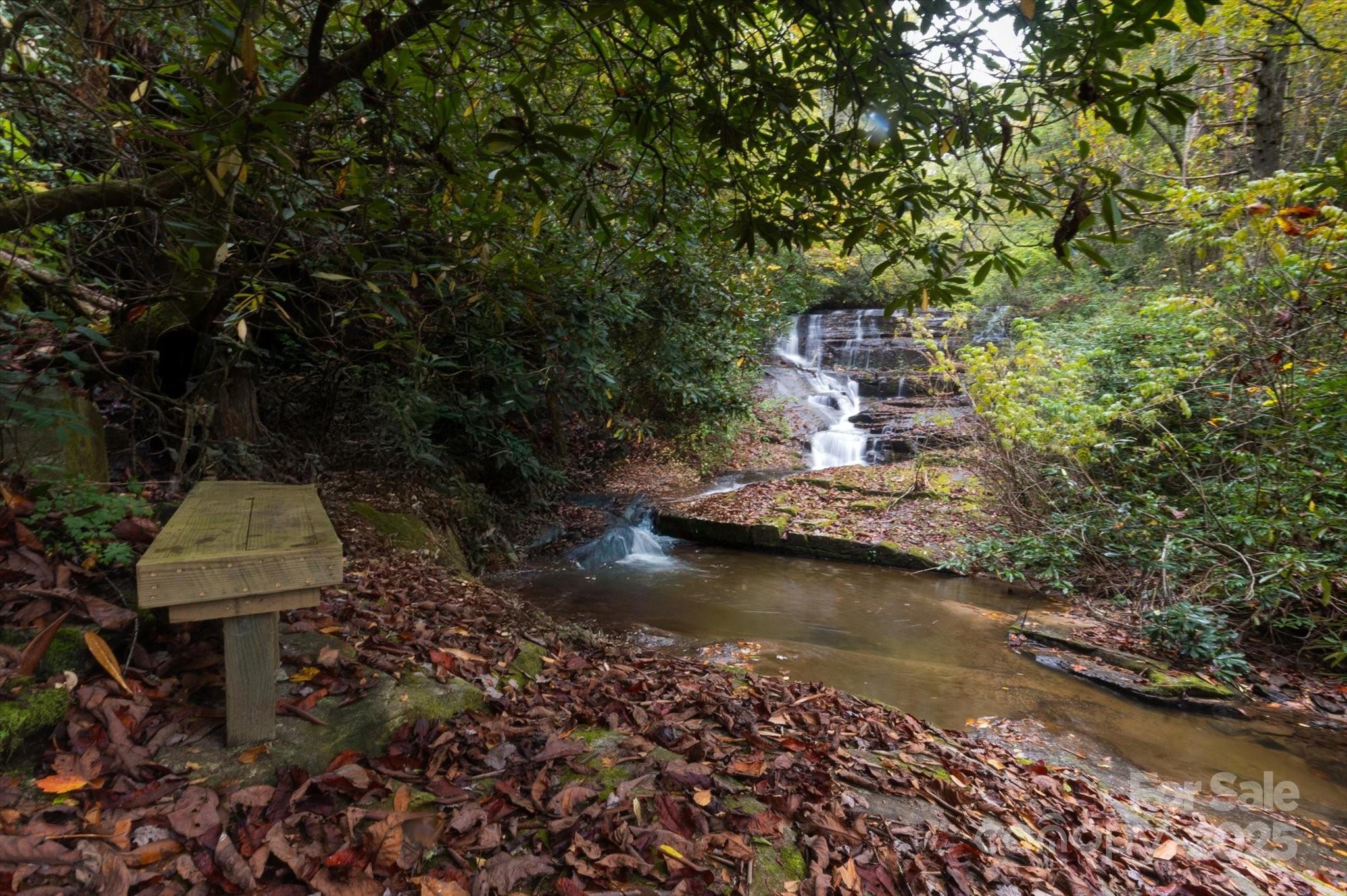 909 Green Hill Road Brevard, NC 28712 - Photo 35 of 44 a backyard of a house with a yard and outdoor seating