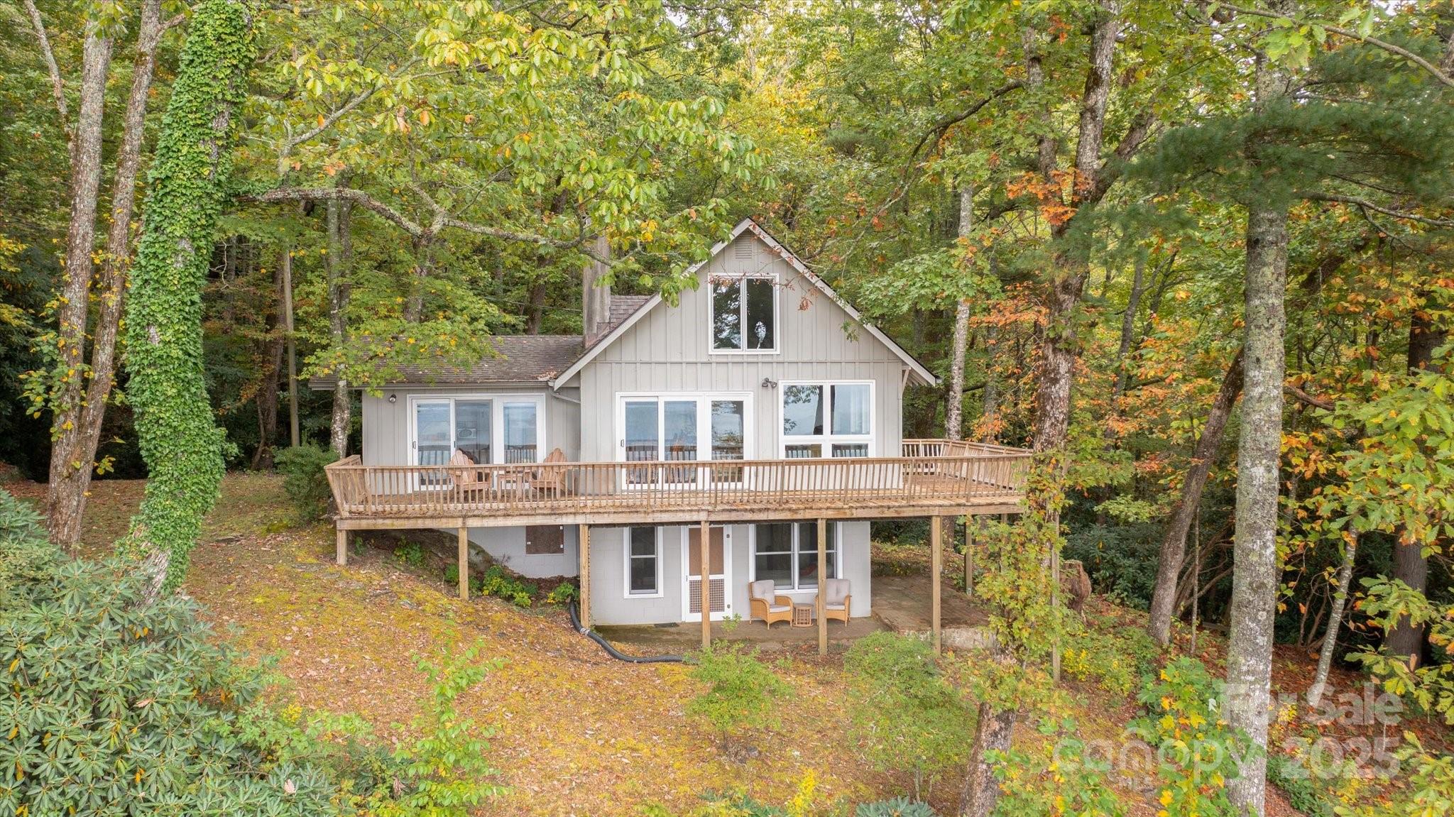 909 Green Hill Road Brevard, NC 28712 - Photo 42 of 44 a house view with a garden space