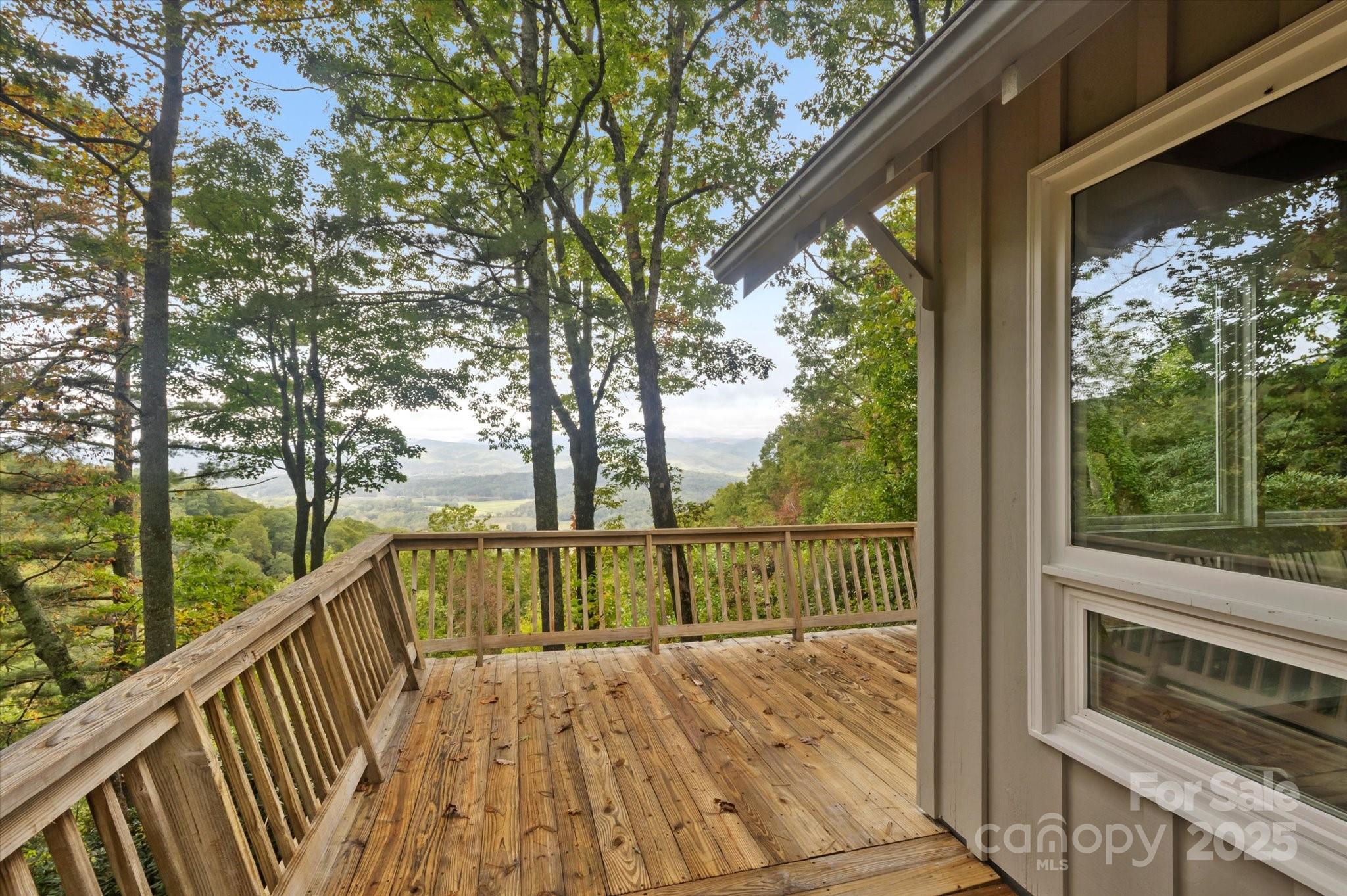 909 Green Hill Road Brevard, NC 28712 - Photo 5 of 44 a view of balcony with wooden floor and fence