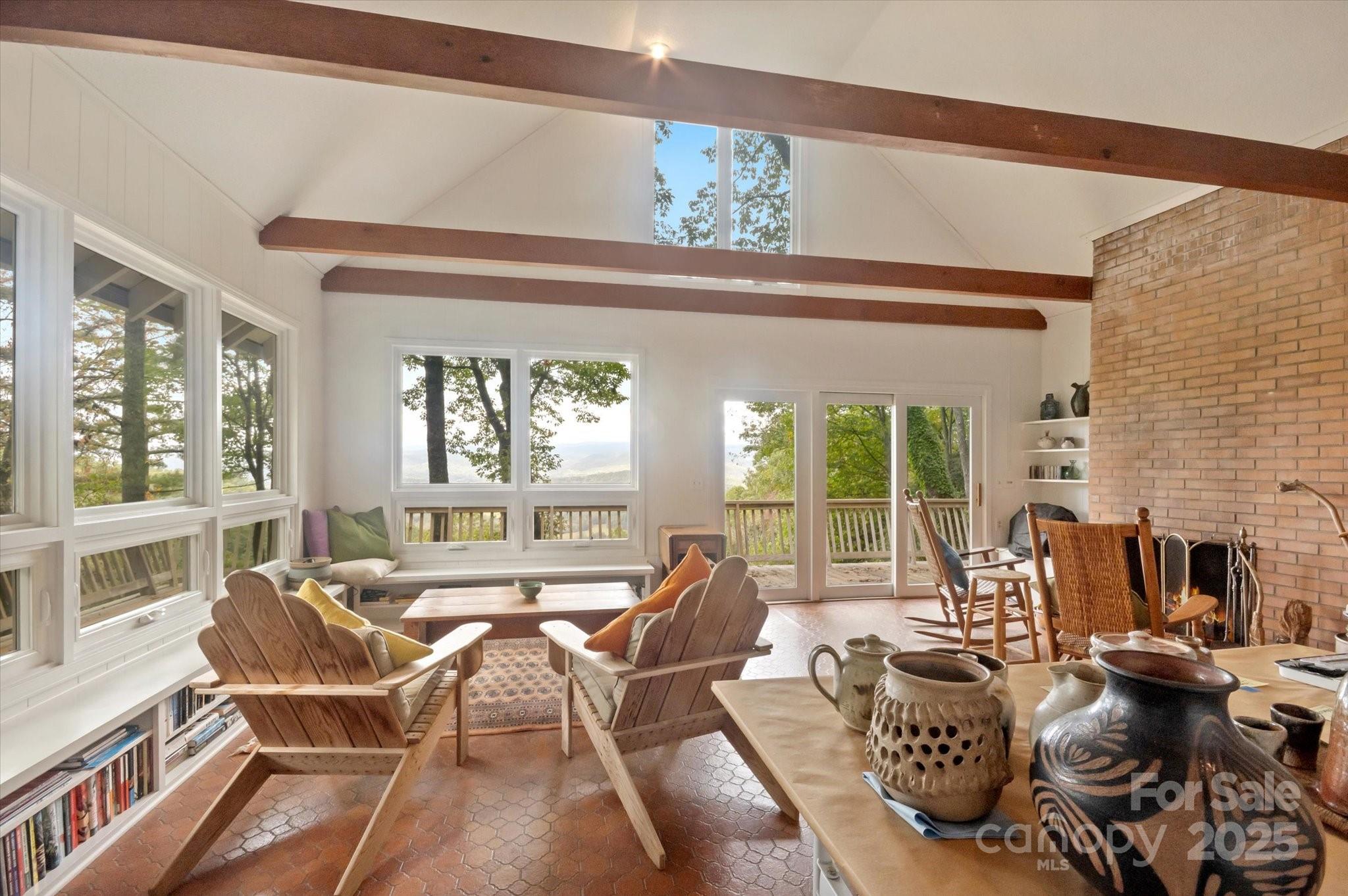 909 Green Hill Road Brevard, NC 28712 - Photo 8 of 44 a living room with furniture and a large window