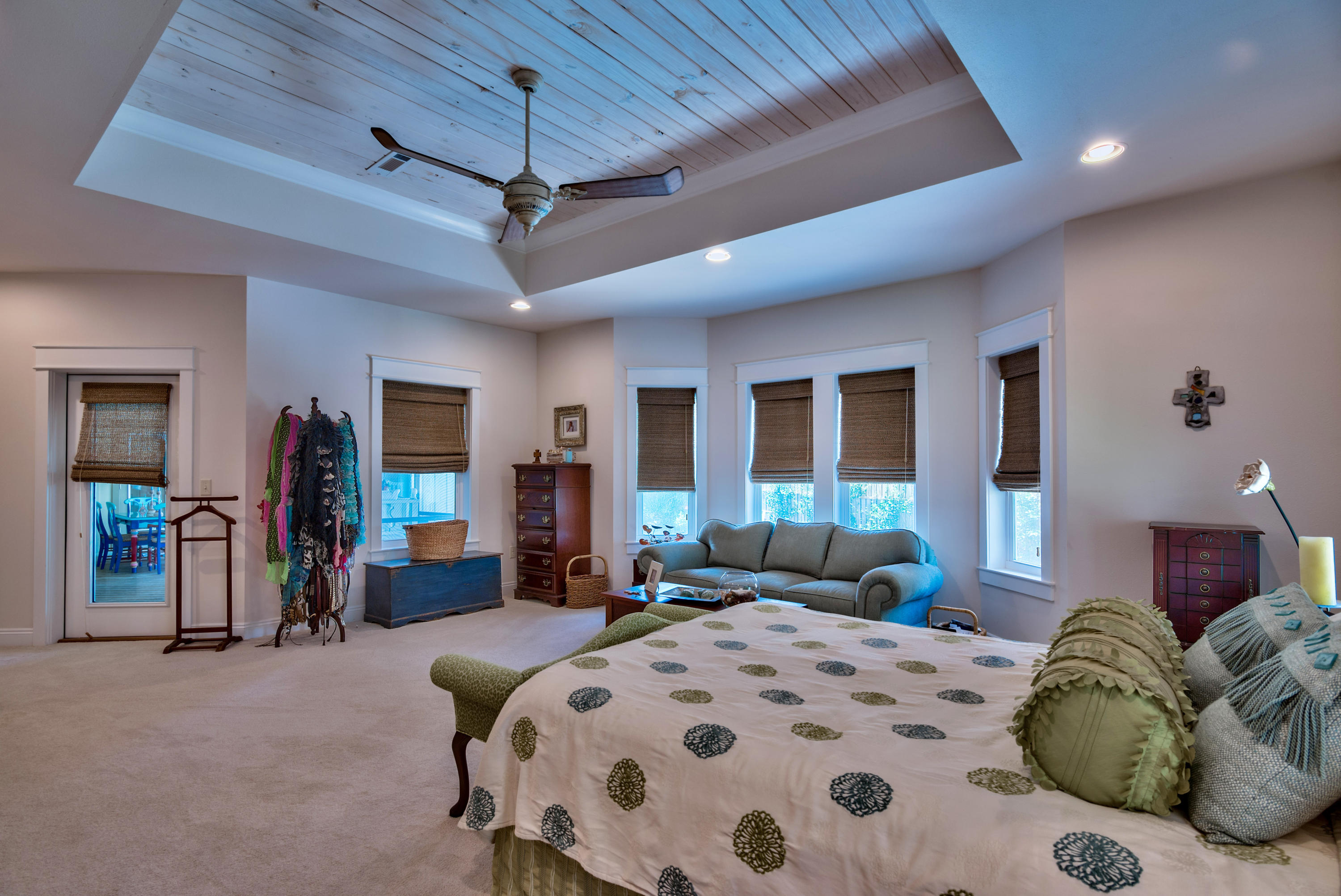 170 Sunrise Circle Santa Rosa Beach, FL 32459 - Photo 14 of 37 a bedroom with a bed ceiling fan and a wooden floor