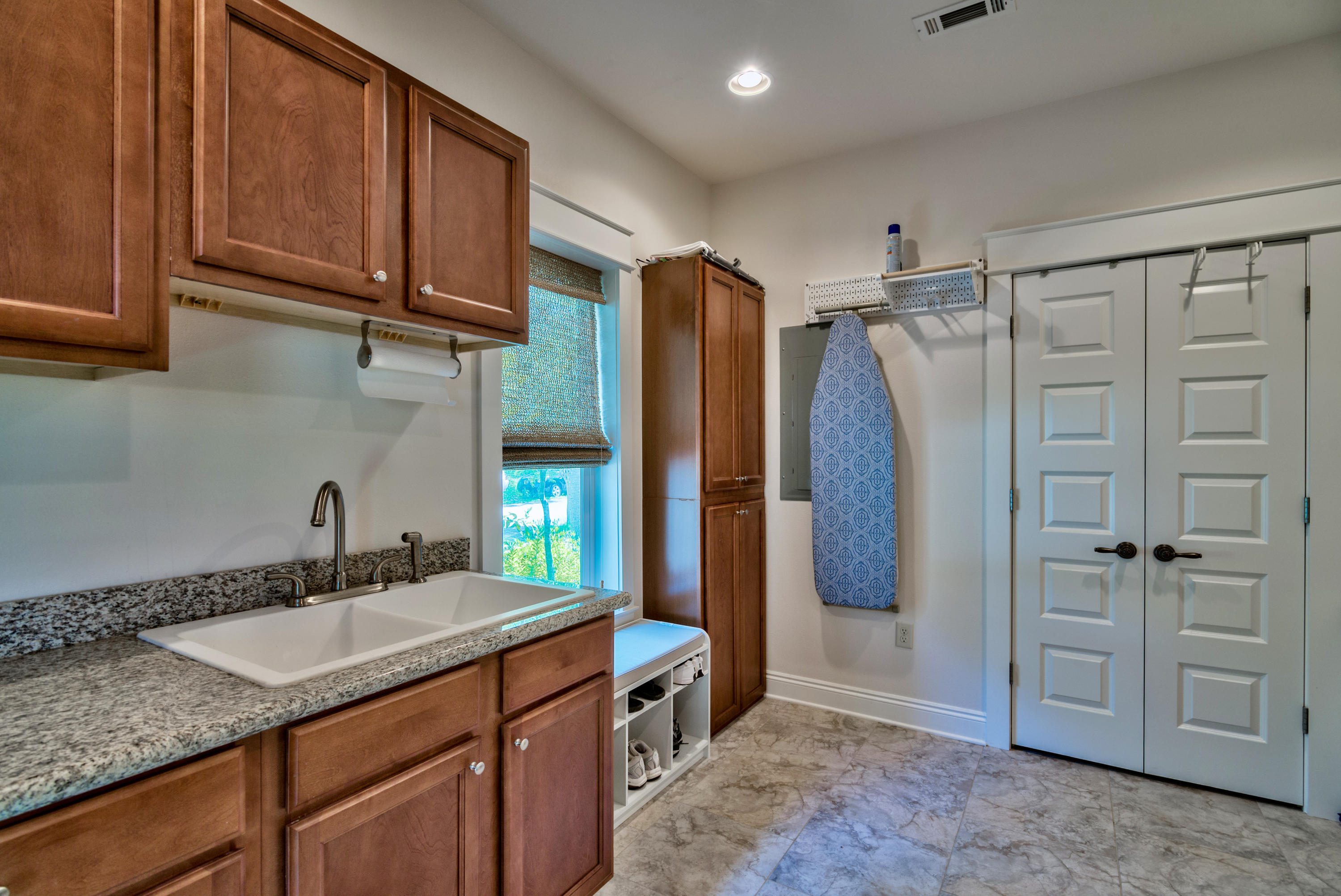 170 Sunrise Circle Santa Rosa Beach, FL 32459 - Photo 20 of 37 a bathroom with a granite countertop sink a mirror a shower and a bathtub