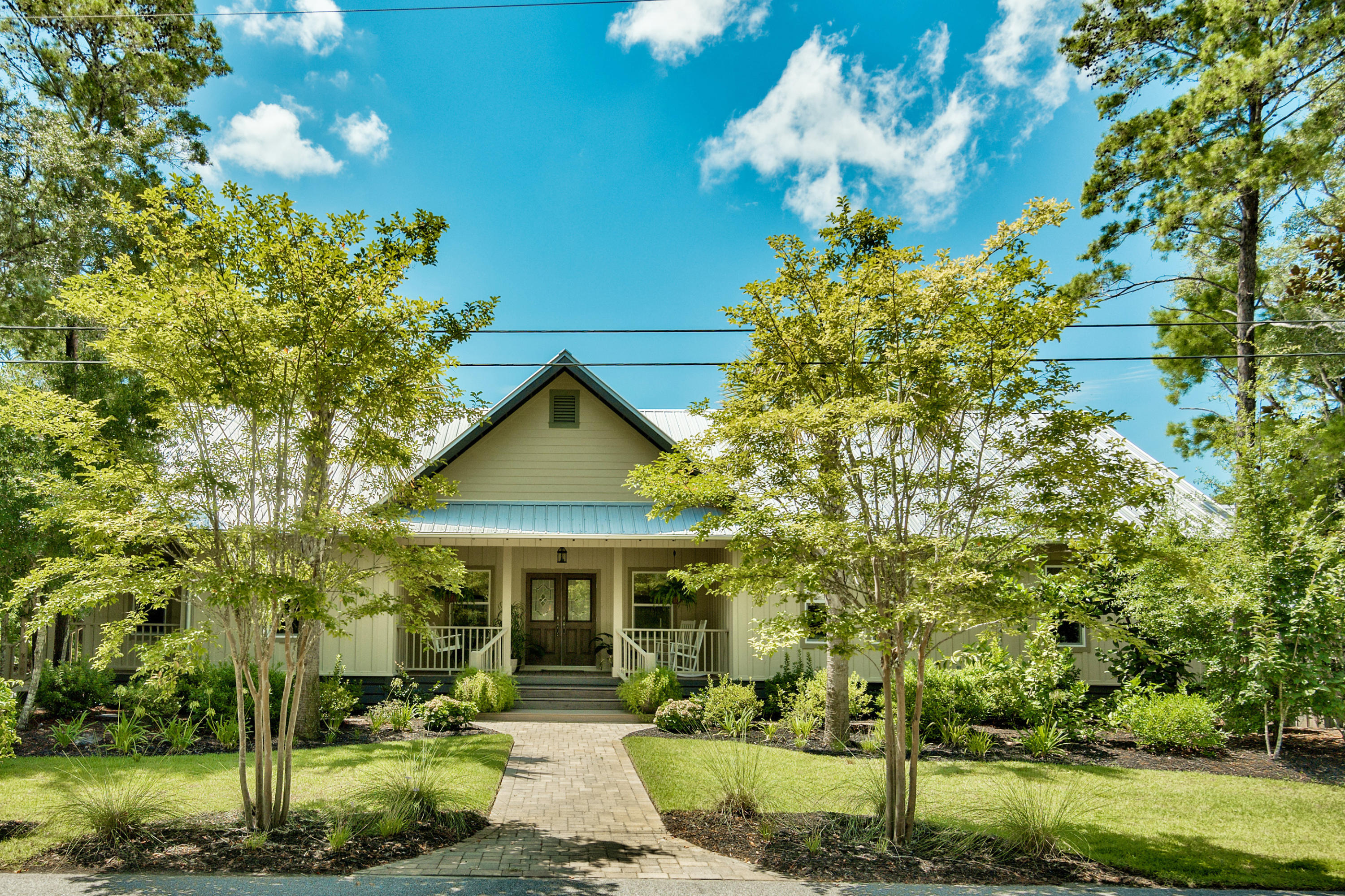 170 Sunrise Circle Santa Rosa Beach, FL 32459 - Photo 2 of 37 a front view of a house with a yard