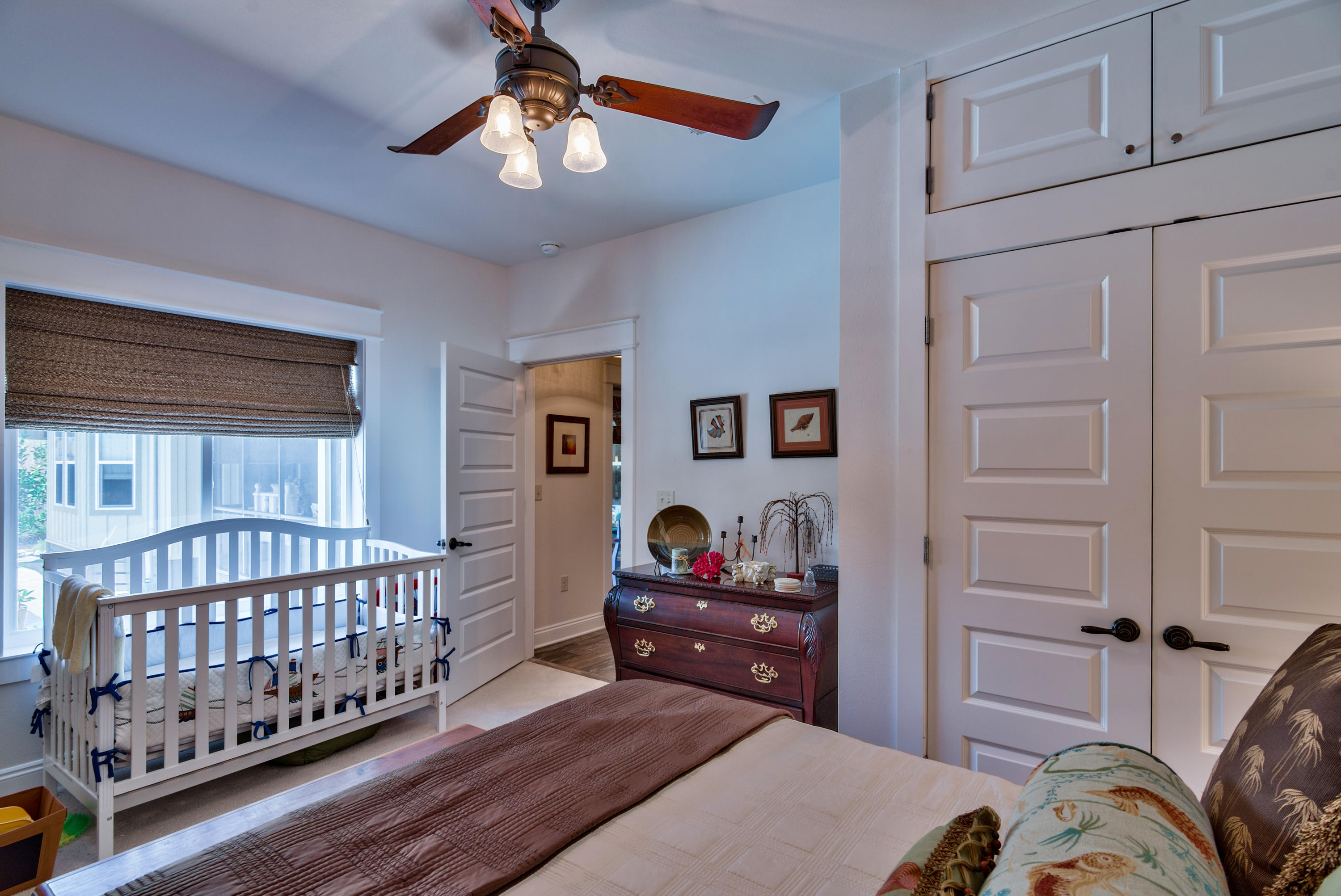 170 Sunrise Circle Santa Rosa Beach, FL 32459 - Photo 23 of 37 a bedroom with furniture and a baby crib