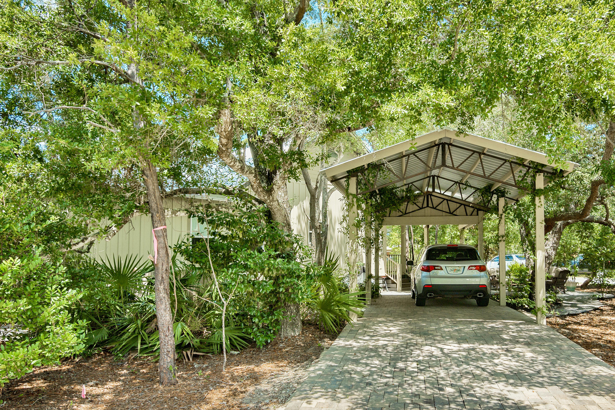 170 Sunrise Circle Santa Rosa Beach, FL 32459 - Photo 34 of 37 a view of a car parked in front of a house
