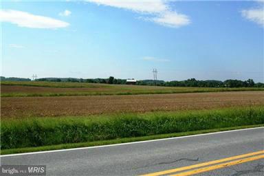 12914 Detour Road Keymar, MD 21757 - Photo 3 of 18 a view of a lake with a city view