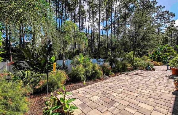 a backyard of a house with lots of green space