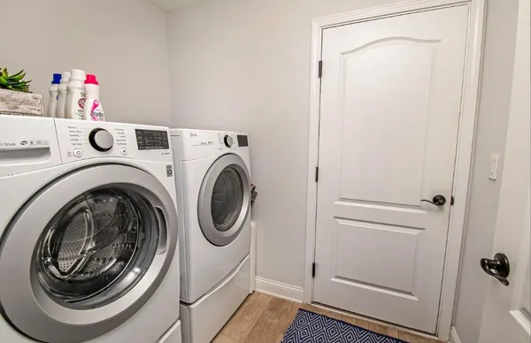 a utility room with dryer and washer
