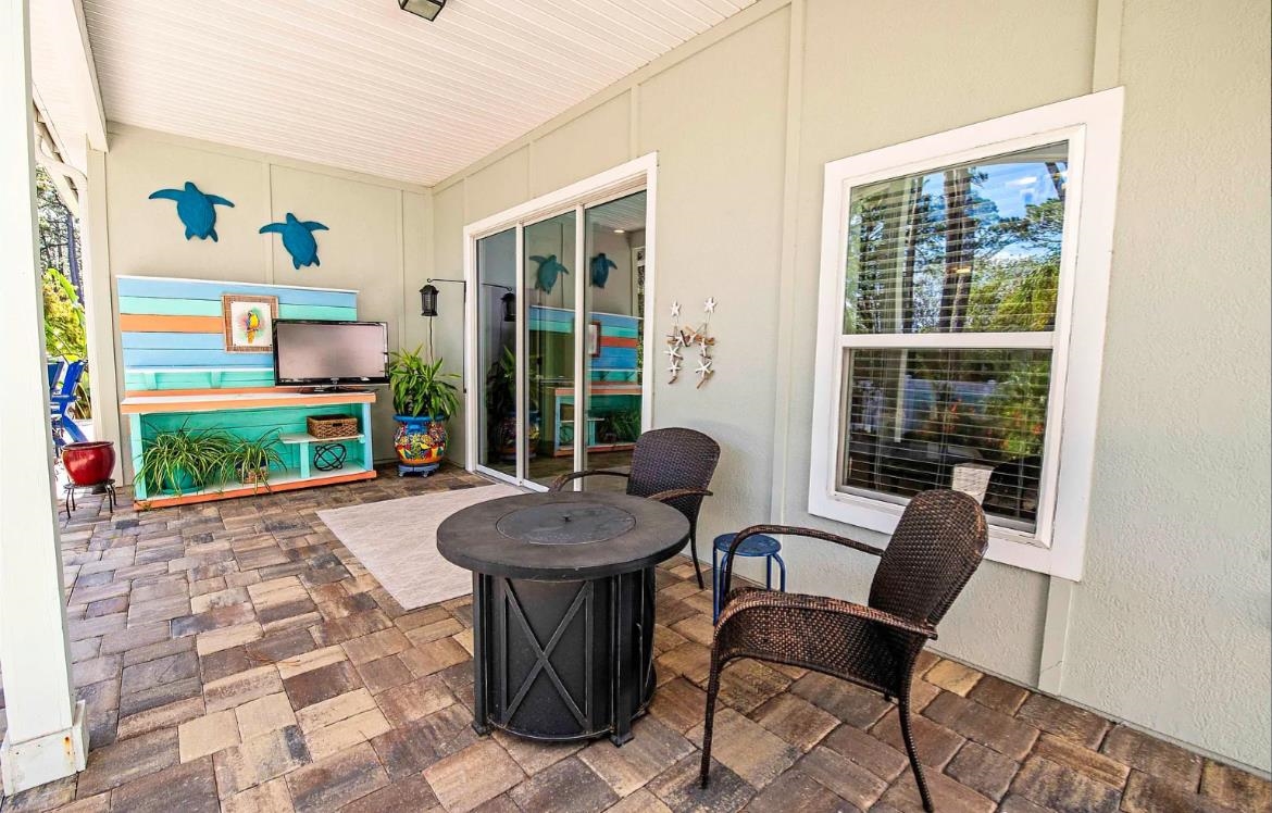 249 Lost Lake Drive St. Augustine, FL 32086 - Photo 10 of 22 a view of a dining room with furniture window and outside view
