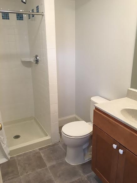 11 Lanark Road, Unit 1 Brookline, MA 02445 - Photo 5 of 11 a bathroom with a toilet and a shower