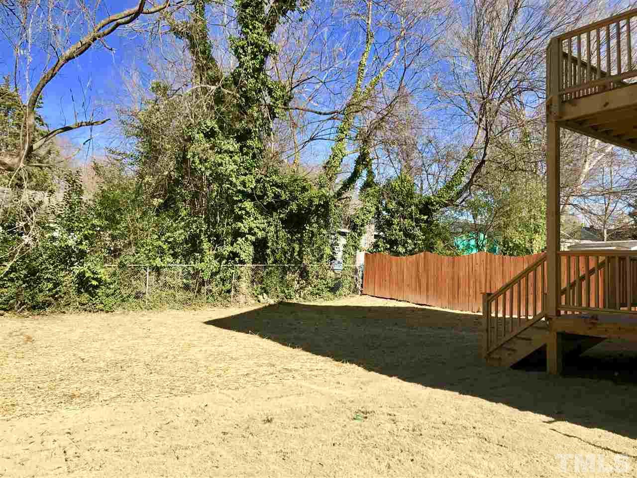 809 East Lenoir Street Raleigh, NC 27601 - Photo 15 of 20 a view of wooden fence and a yard