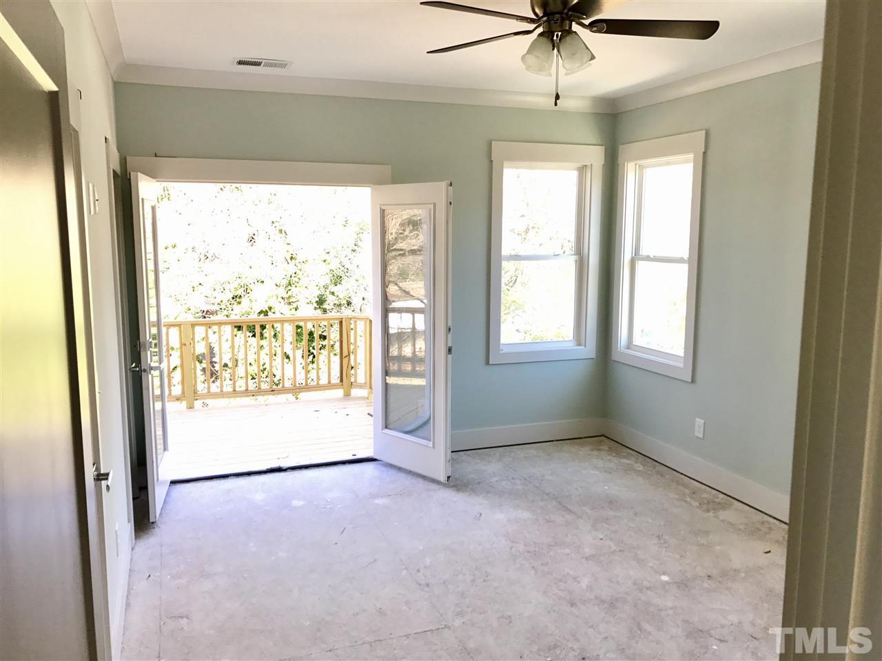 809 East Lenoir Street Raleigh, NC 27601 - Photo 9 of 20 a view of an empty room with a window