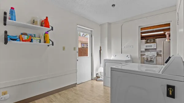 a storage room with washer and dryer