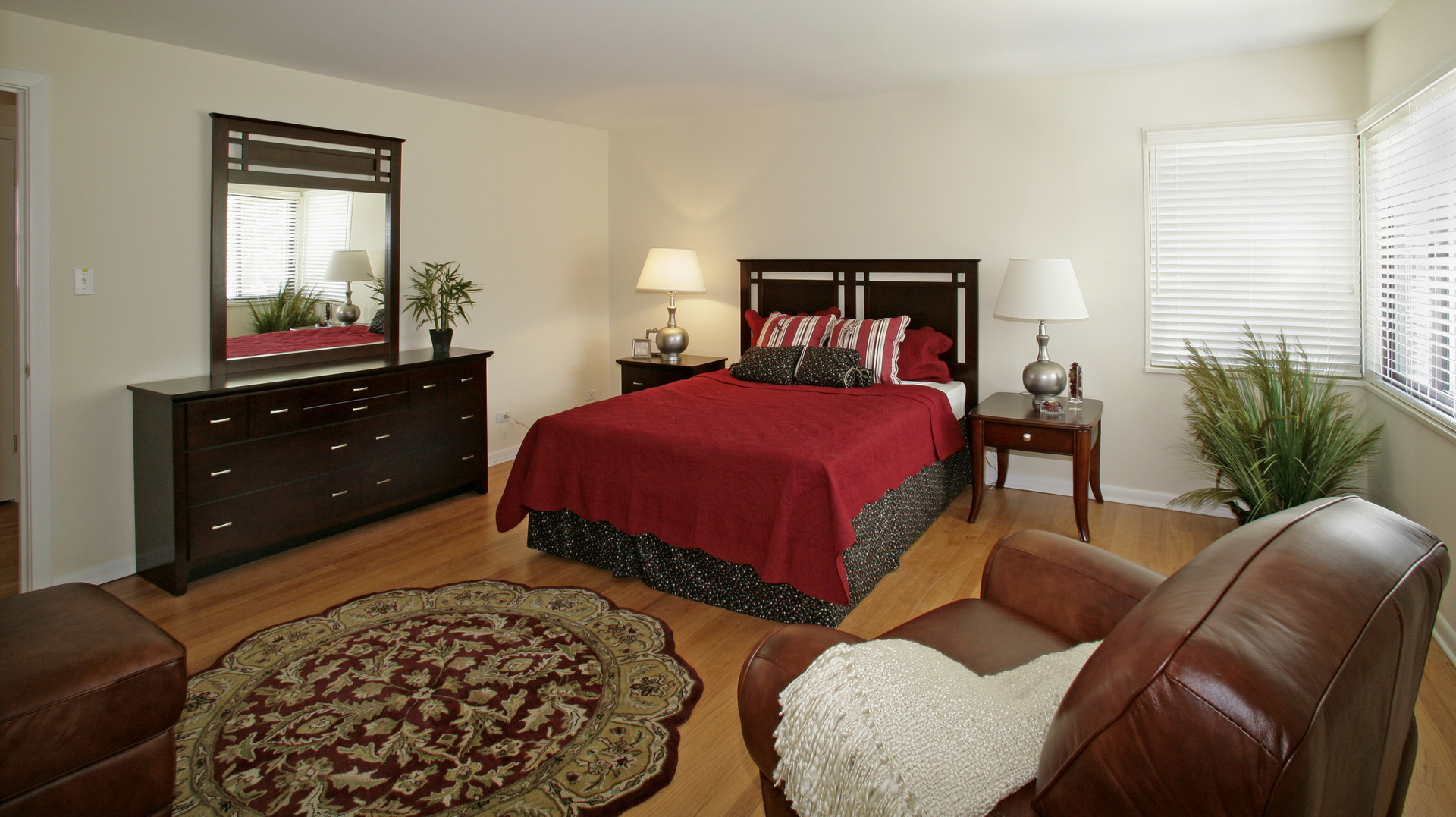 537 Ridge Road, Unit 537 Wilmette, IL 60091 - Photo 7 of 15 a bedroom with a bed and closet with mirror
