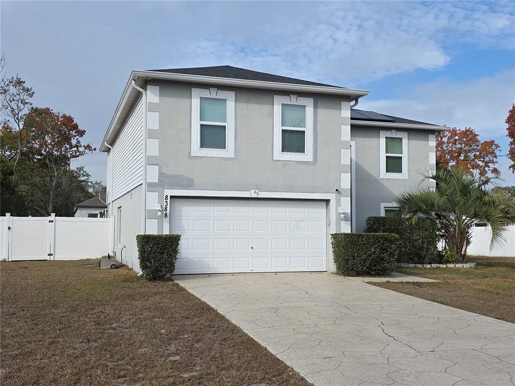 8388 Maltby Road Spring Hill, FL 34606 - Photo 2 of 28 a house view with a outdoor space