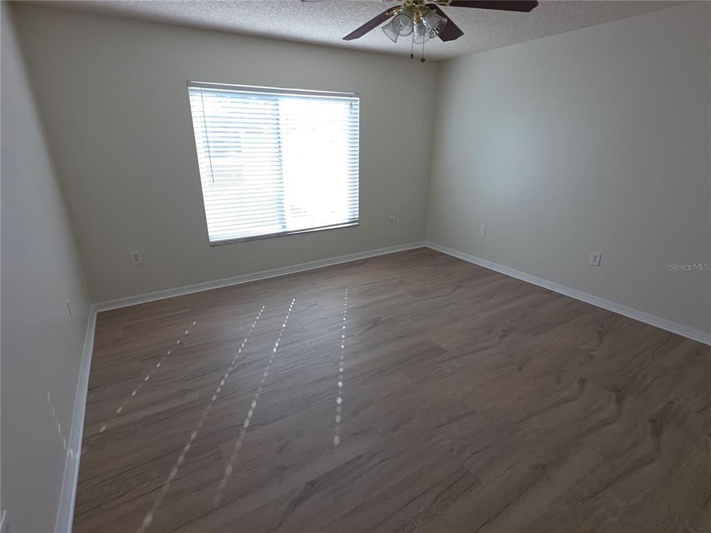 8388 Maltby Road Spring Hill, FL 34606 - Photo 21 of 28 an empty room with a window