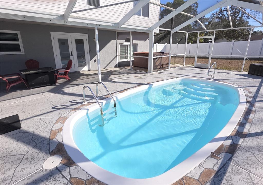 8388 Maltby Road Spring Hill, FL 34606 - Photo 24 of 28 a view of a house with backyard