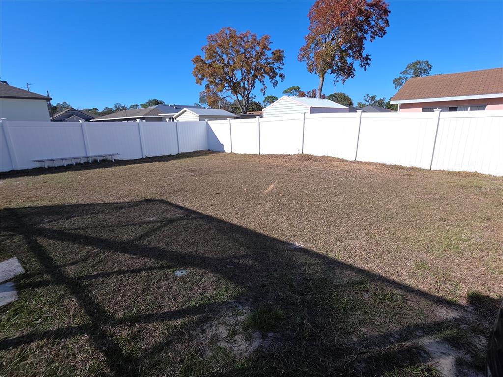 8388 Maltby Road Spring Hill, FL 34606 - Photo 27 of 28 a view of a backyard of the house