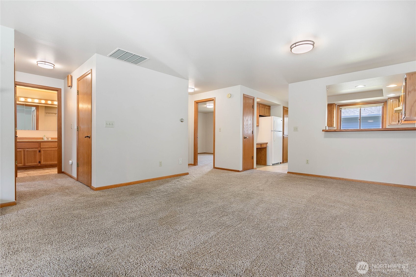 1843 Main Street, Unit G2 Lynden, WA 98264 - Photo 11 of 30 an empty room with windows and cabinet