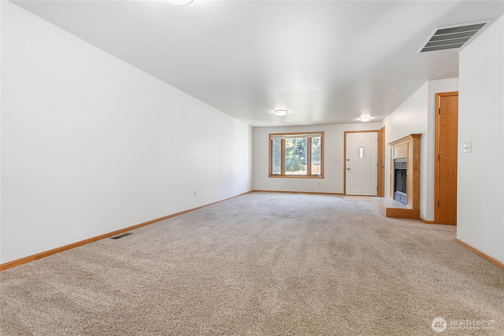 1843 Main Street, Unit G2 Lynden, WA 98264 - Photo 13 of 30 an empty room with windows and closet