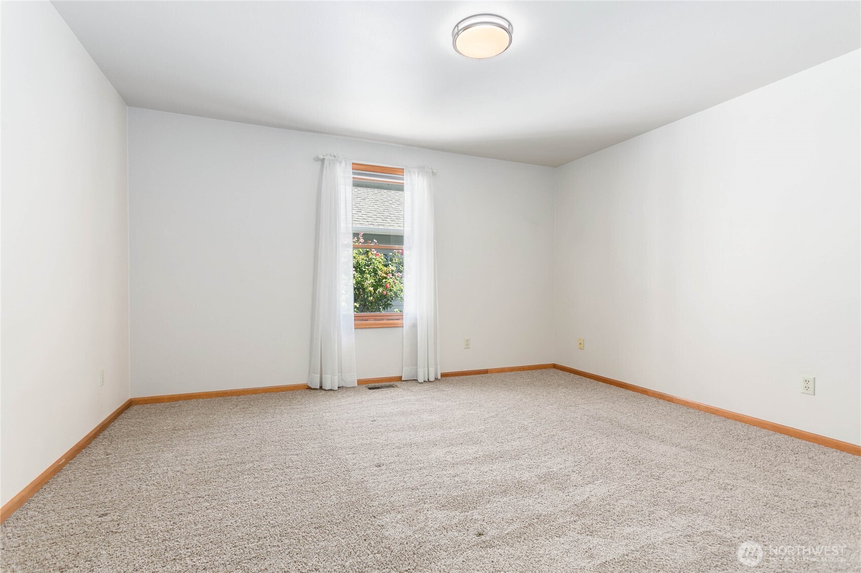 1843 Main Street, Unit G2 Lynden, WA 98264 - Photo 18 of 30 an empty room with windows